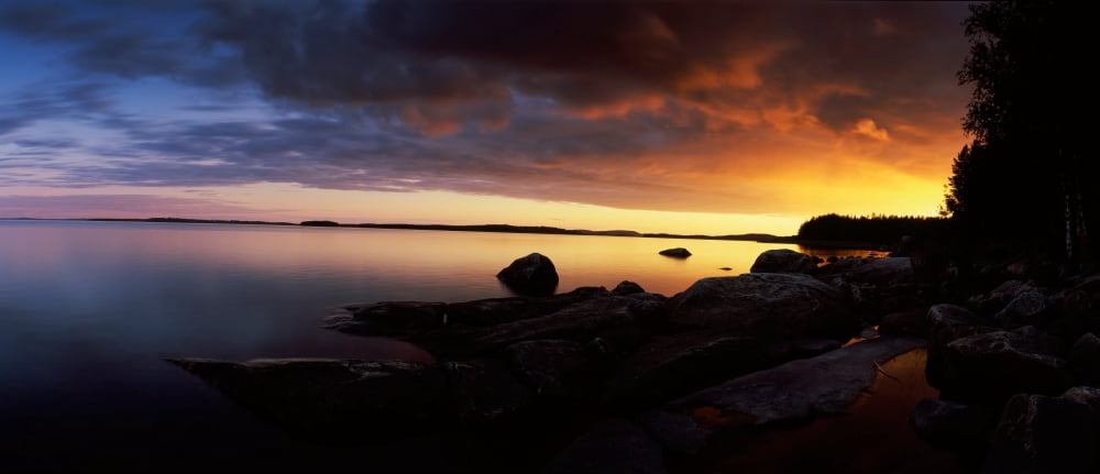Clouds over a lake Lake Pielinen Lieksa Eastern Finland North Karelia Finland Canvas Art - Panoramic Images (36 x 12)