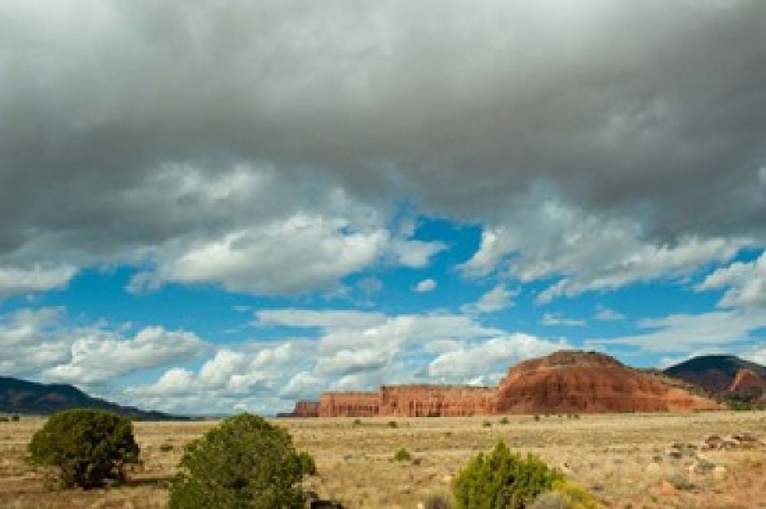 Clouds over an arid landscape Capitol Reef National Park Utah USA Canvas Art - Panoramic Images (36 x 24)