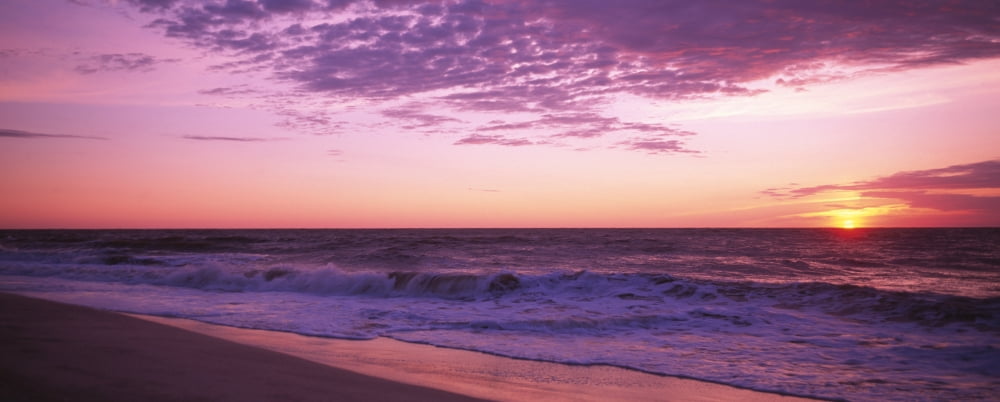 Clouds over an ocean at dawn Canvas Art - Panoramic Images (36 x 12)