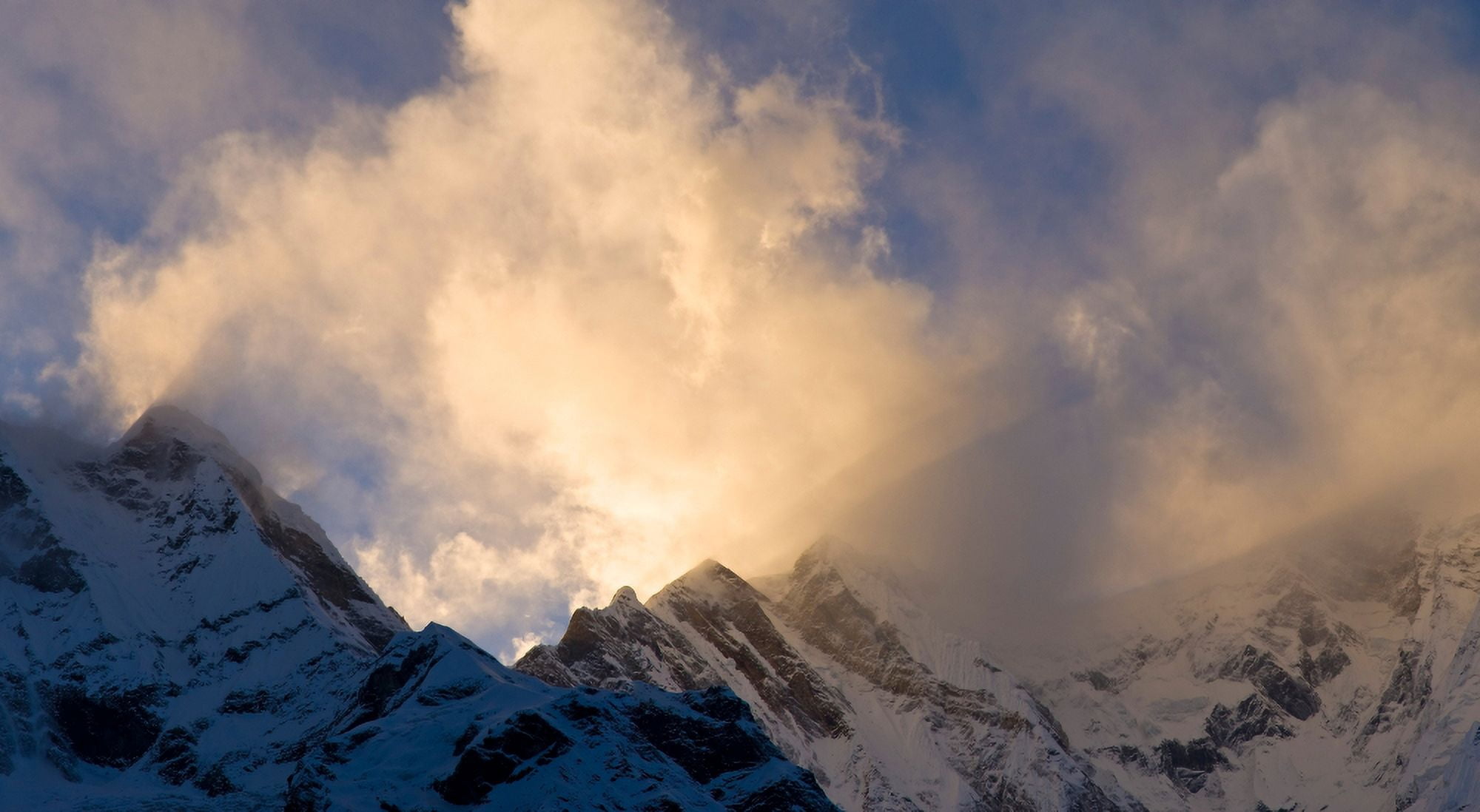Clouds over snowcapped mountain Annapurna Base Camp Annapurna Range Himalayas Nepal Canvas Art - Panoramic Images (9 x 27)