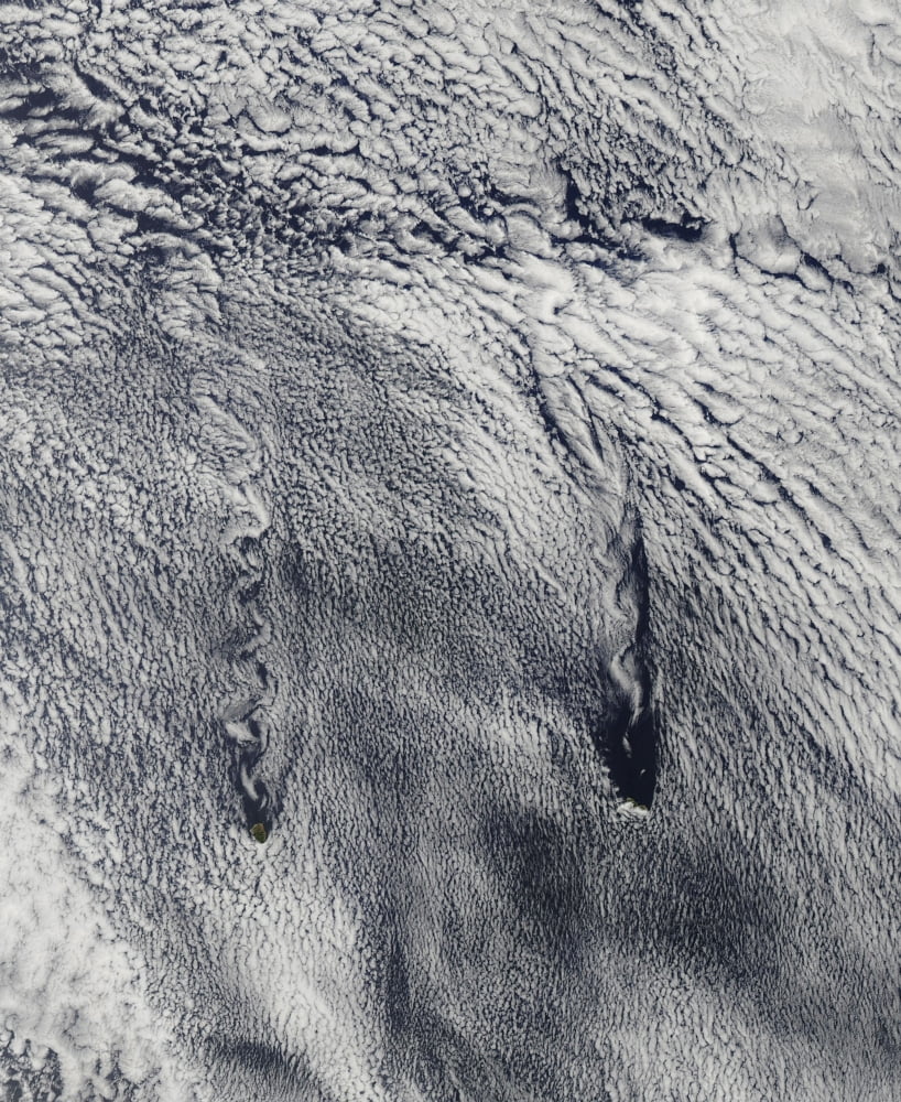 Clouds over the Juan Fernandez Islands form into vortices Canvas Art - Stocktrek Images (25 x 31)