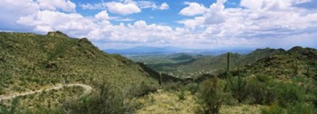 Clouds over the Tucson Mountain Park Tucson Arizona USA Canvas Art - Panoramic Images (18 x 7)
