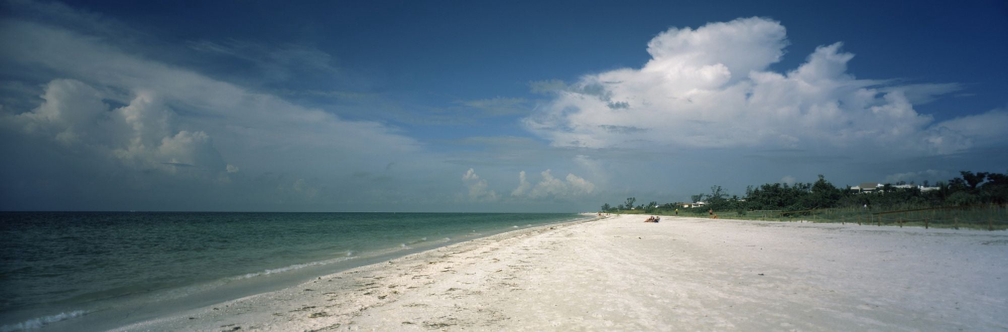 Clouds over the beach Lighthouse Beach Sanibel Island Fort Myers Florida USA Canvas Art - Panoramic Images (27 x 9)