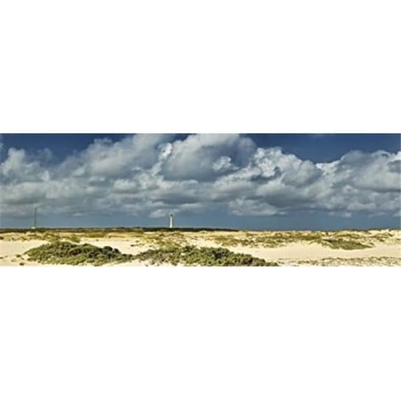 Clouds over the beach with California Lighthouse in the background Aruba Poster Print by - 36 x 12