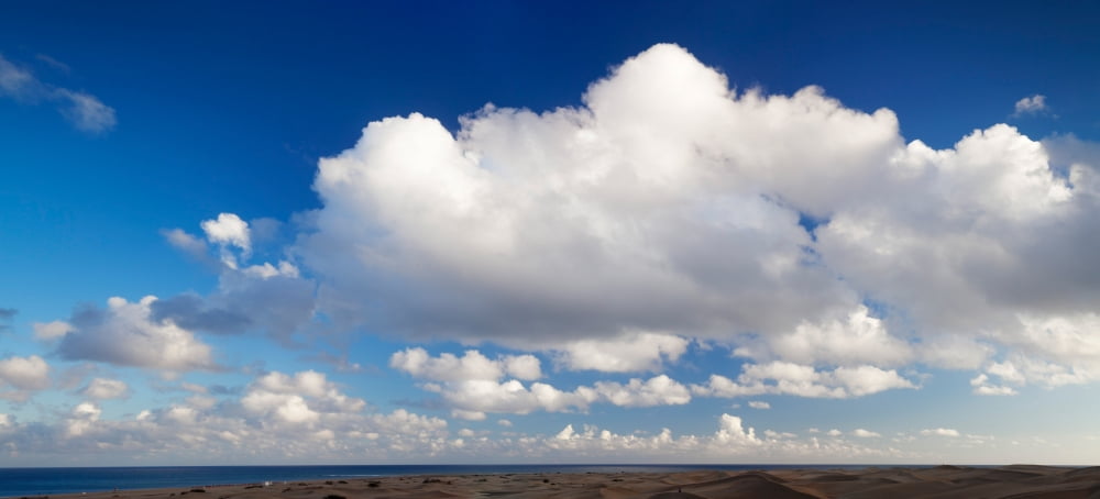 Clouds over the sea Maspalomas Grand Canary Canary Islands Spain Canvas Art - Panoramic Images (9 x 27)