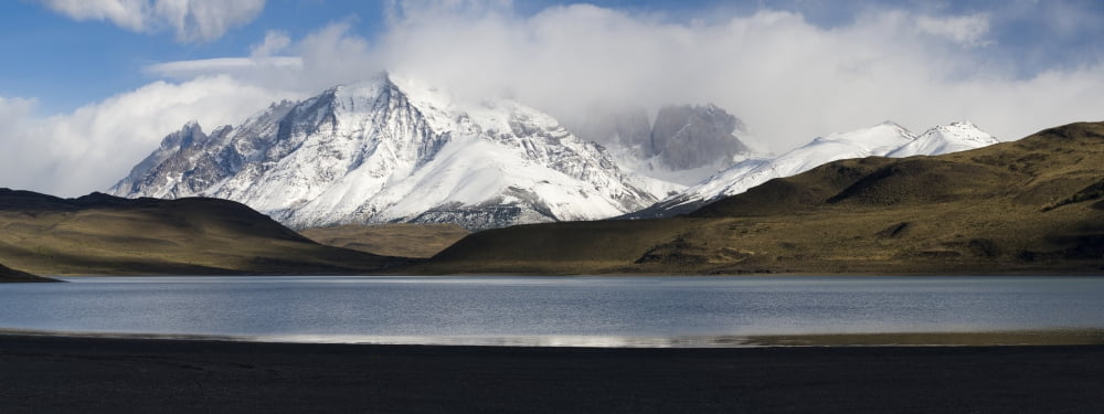 Clouds over snowcapped mountains Towers of Paine Mt Almirante Nieto seen from Laguna Amarga Torres Del Paine National Park Chile Canvas Art - Panoramic Images (36 x 12)