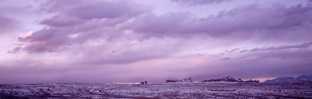 Cloudy evening sky in winter Arches National Park Utah USA Canvas Art - Panoramic Images (12 x 36)