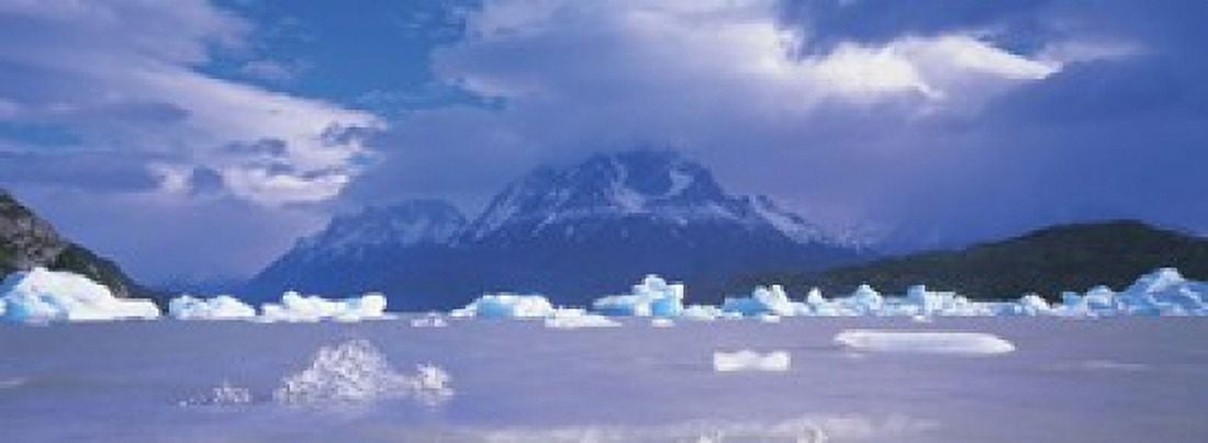 Cloudy sky over mountains Lago Grey Torres del Paine National Park Patagonia Chile Canvas Art - Panoramic Images (18 x 7)