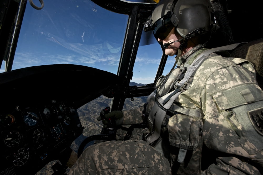 Co-pilot flying a CH-47 Chinook helicopter Canvas Art - Terry MooreStocktrek Images (18 x 12)