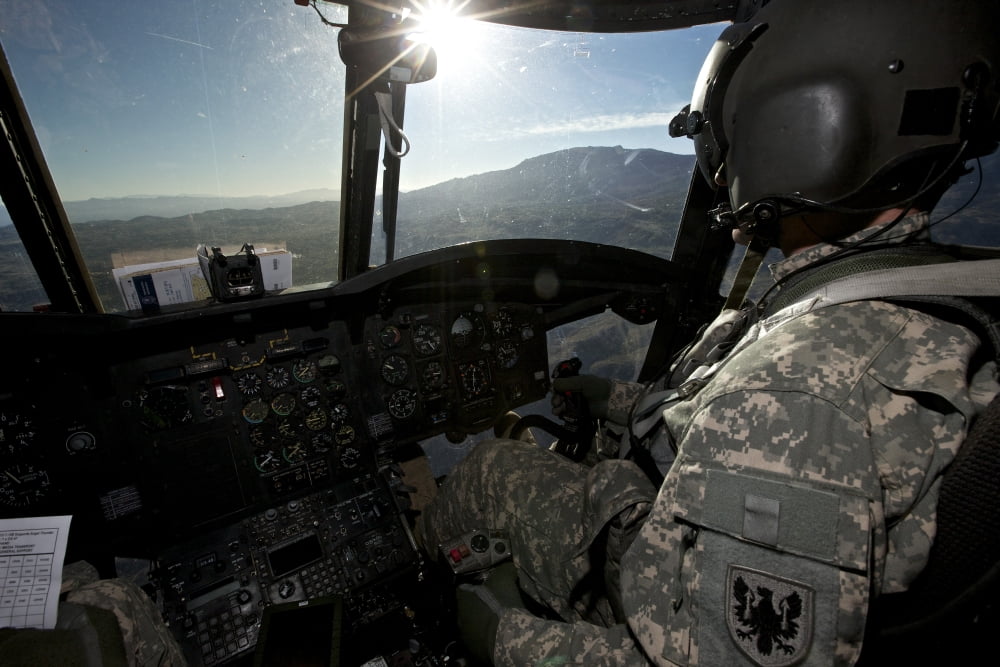 Co-pilot flying a CH-47 Chinook helicopter Canvas Art - Terry MooreStocktrek Images (18 x 12)