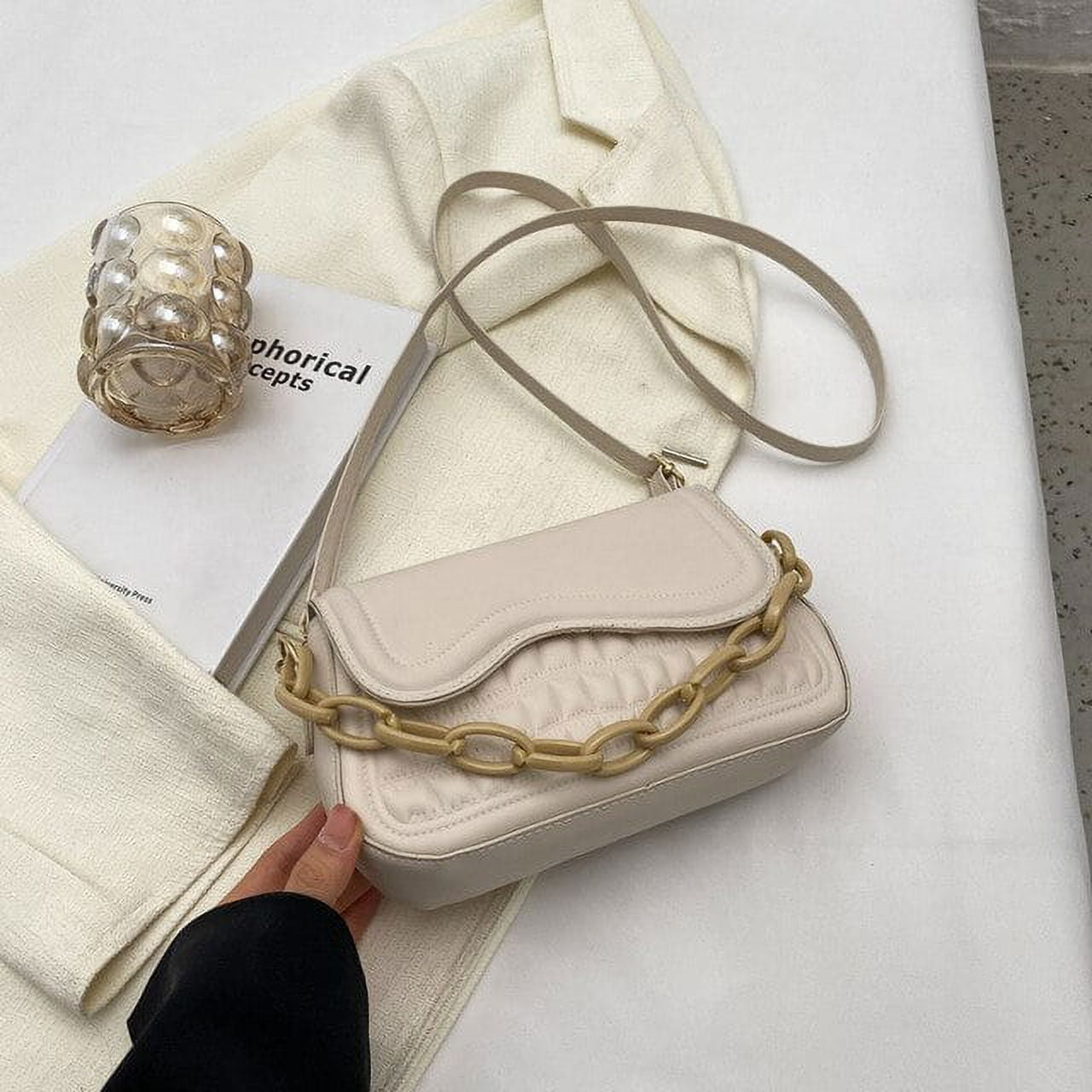 Female designer handbags hotsell
