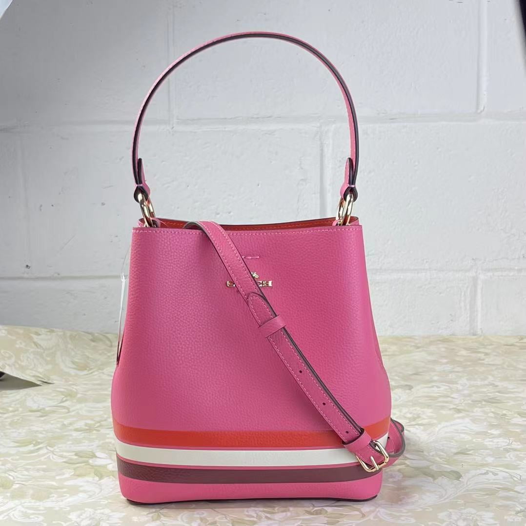 Buy the Coach Handbag Chocolate/Pink