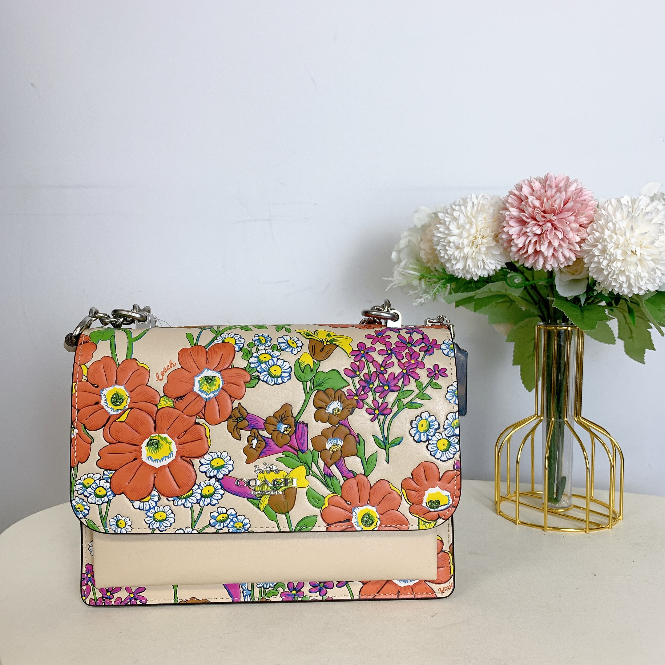 Coach floral sling bag hotsell