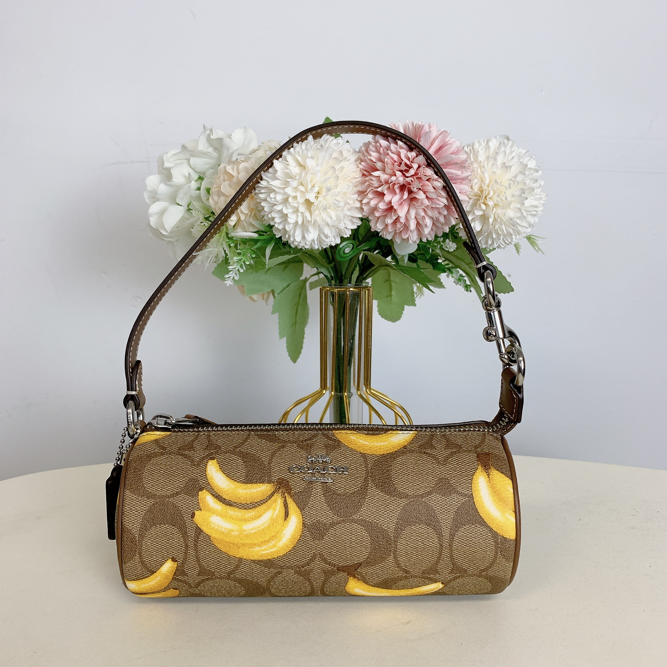 Coach Nolita Barrel Bag in Signature Canvas Banana Print