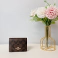 thumbnail image 1 of Coach Women's Mini Wallet on a Chain in Signature Canvas Leather (Brown / Black), 1 of 7