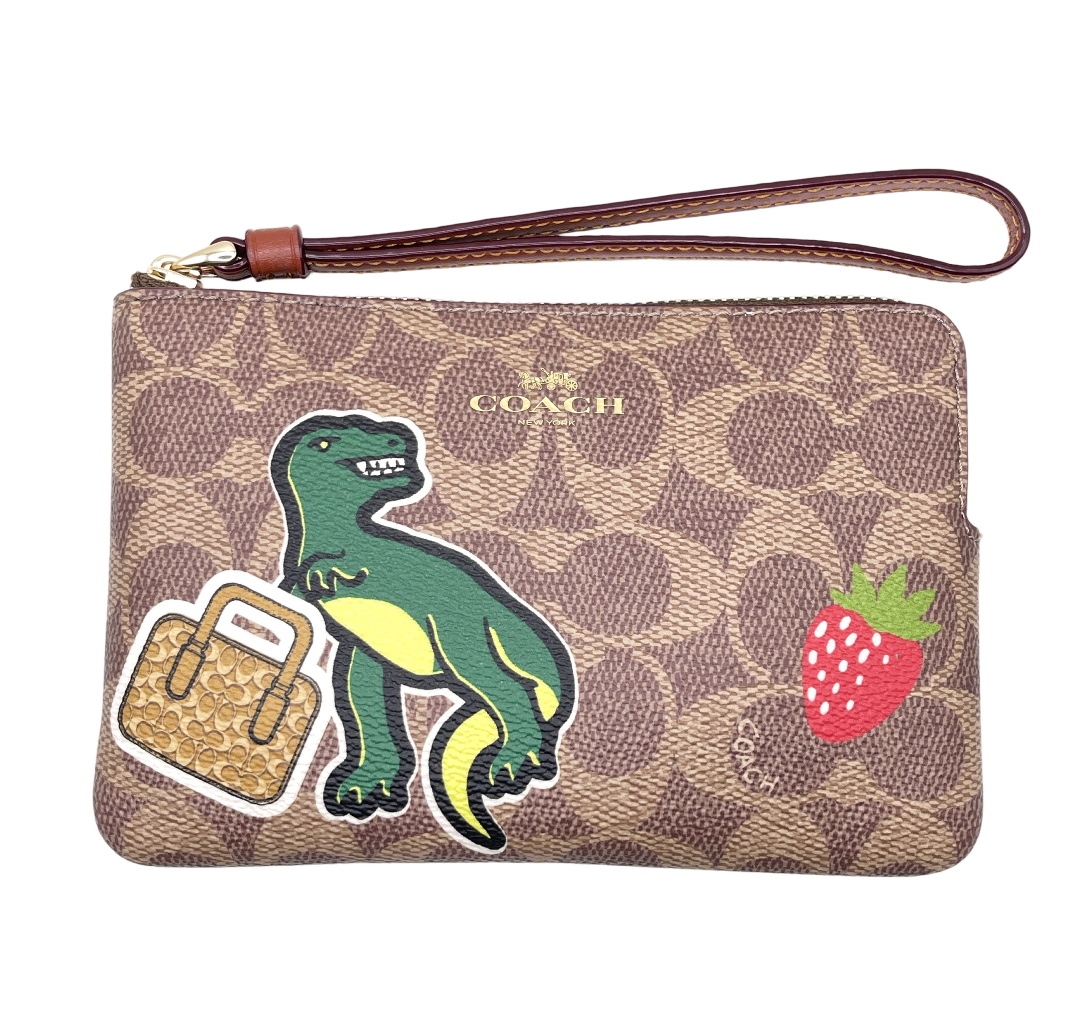 Coach Women s Small Corner Zip Wristlet in Signature Canvas with Sticker Print Tan Multi