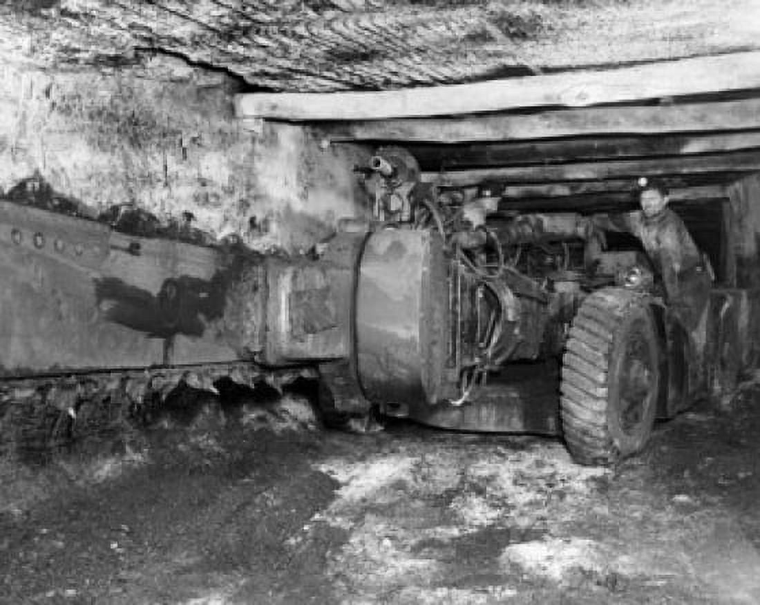 Coal miner operating a cutting machine in a coal mine Canvas Art - (24 x 36)