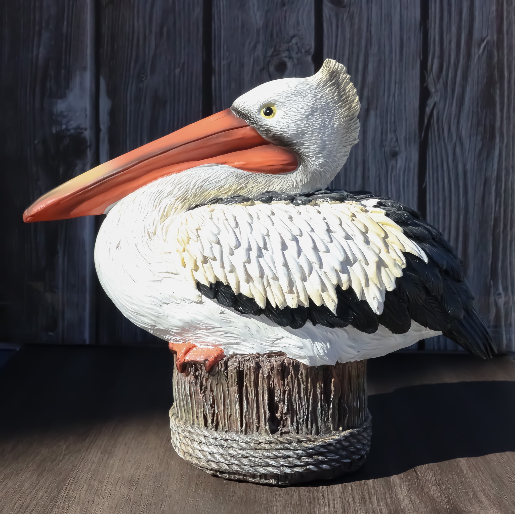Naturalistic Hand-Painted Resin Pelican Statue on Aged Dock Post