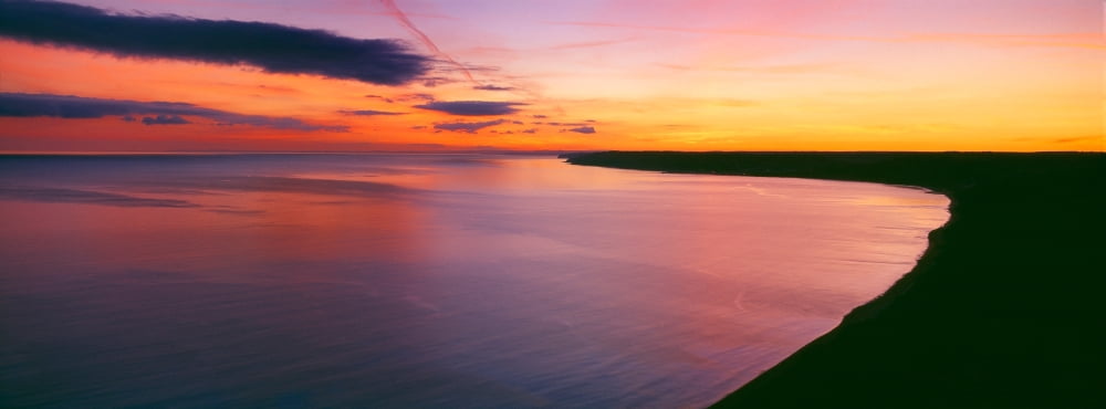 Coastline at dusk Lyme Bay Dorset England Canvas Art - Panoramic Images (36 x 12)
