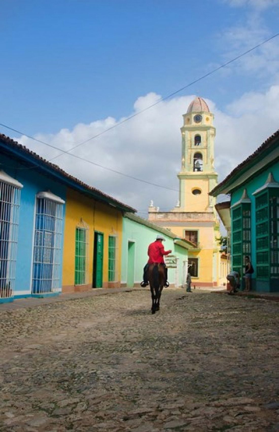Cobblestone street with cowboy on horse Trinidad Cuba Canvas Art - Bill Bachmann DanitaDelimont (22 x 34)