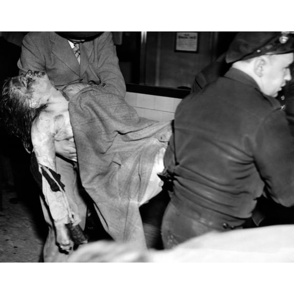 Coconut Grove Nightclub Fire. The Body Of A Young Female Victim Is Removed From The Nightclub. Nov. 28 History