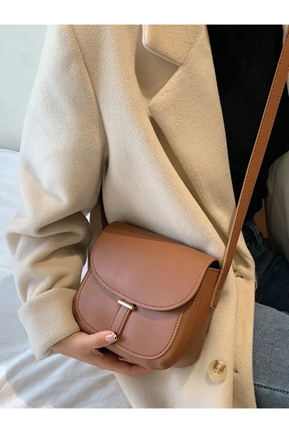 Coffee Brown Saddle Crossbody Bag With Flap Closure And Adjustable Strap