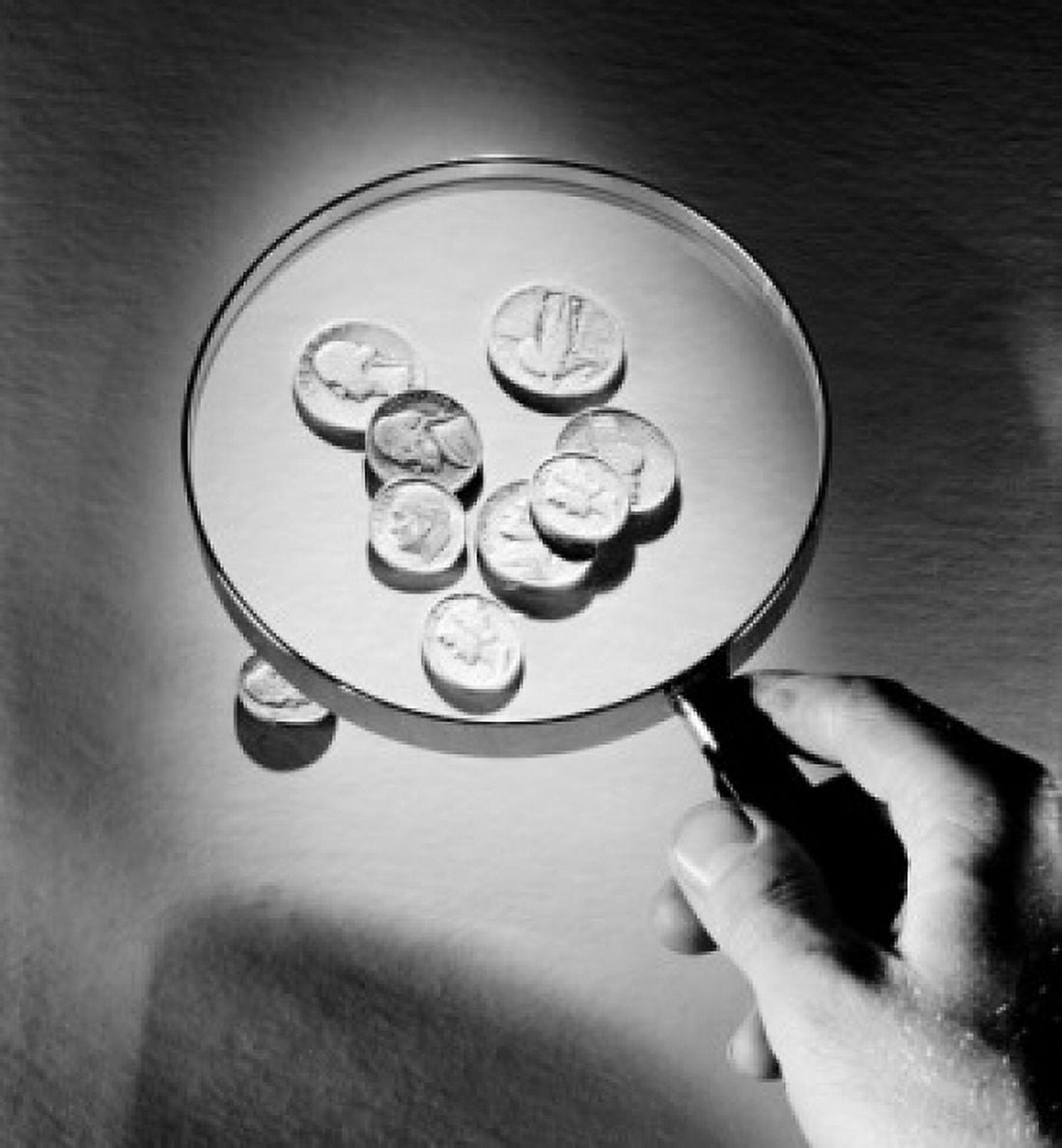 Coins under magnifying glass Canvas Art - (18 x 24)