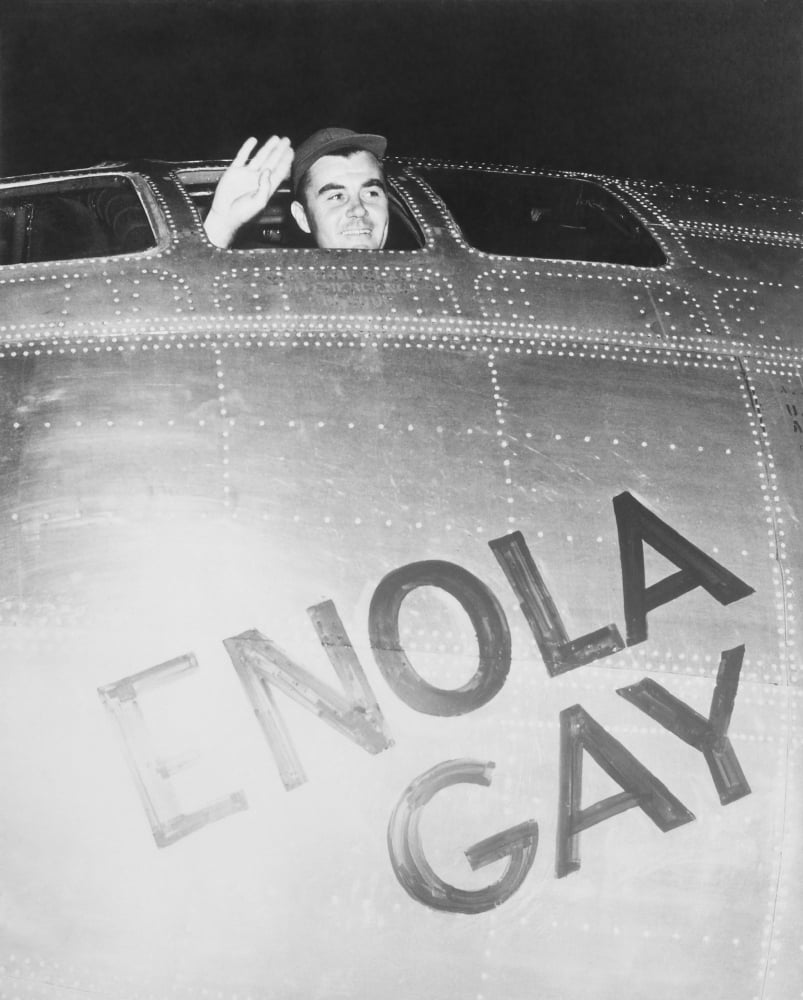 Colonel Paul Tibbets waving from the cockpit of the Enola Gay Canvas Art - John ParrotStocktrek Images (13 x 16)