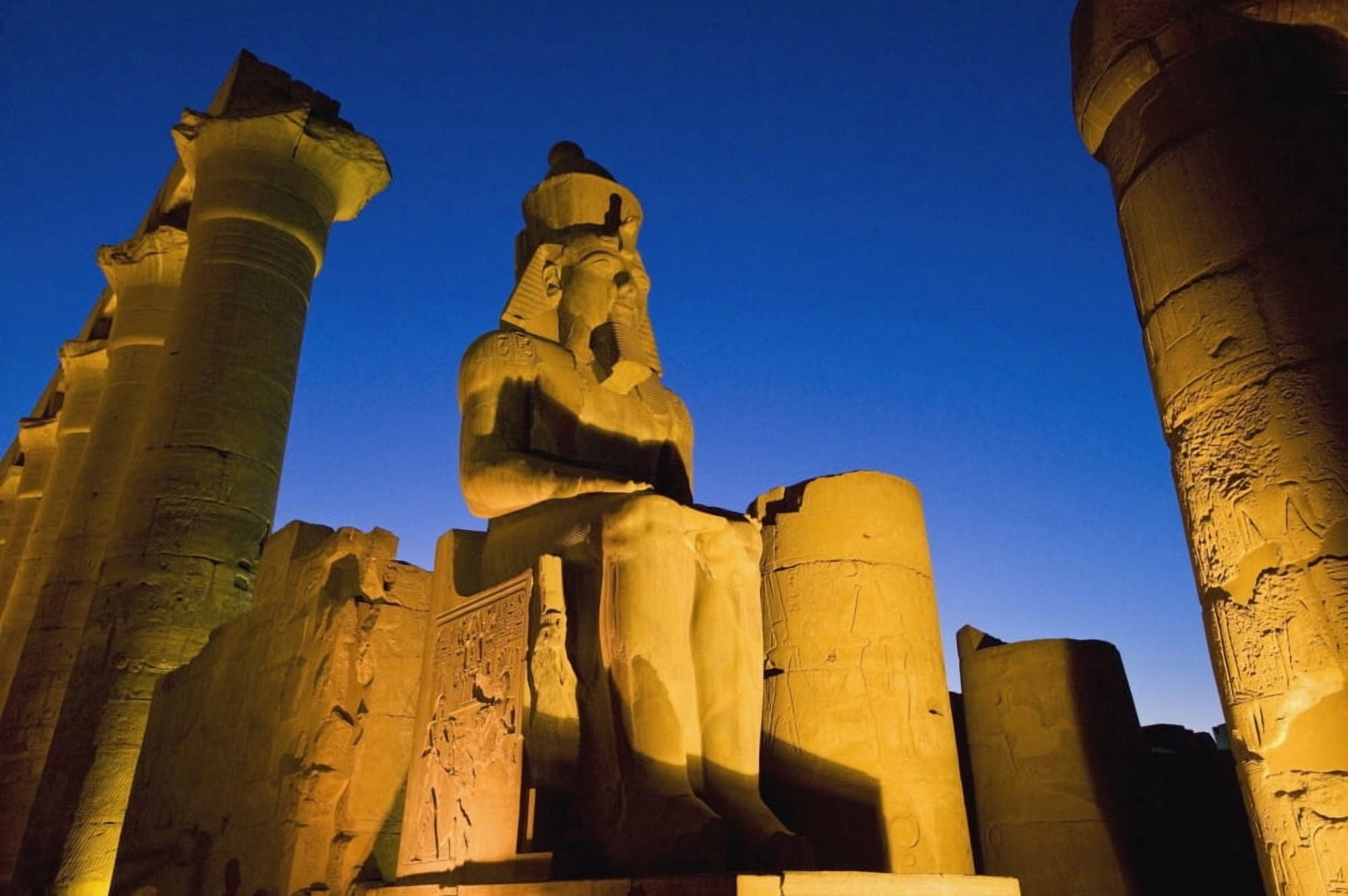 Colonnade Of Amenophis Iii With Statue Of Ramses Ii At Dusk Canvas Art - Ian Cumming Design Pics (34 x 22)