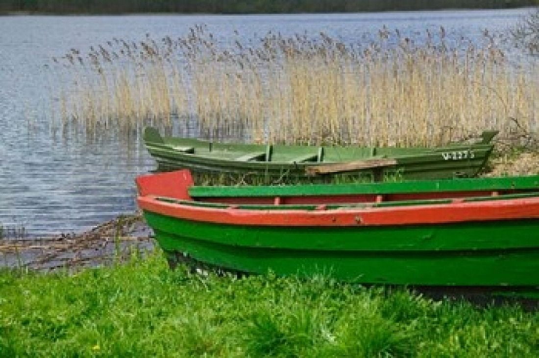Colorful Canoe by Lake Trakai Lithuania I Canvas Art - Keren Su DanitaDelimont (17 x 11)