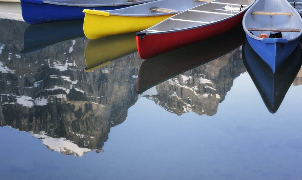 Colorful Canoes At Moraine Lake Banff Alberta Canada Canvas Art - Peter Carroll Design Pics (20 x 11)