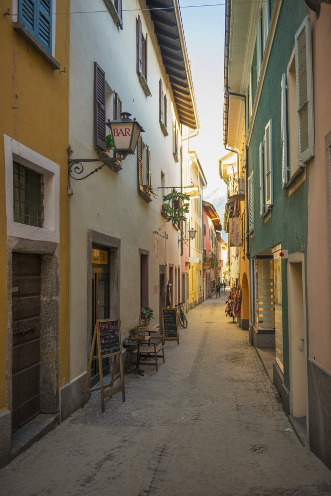 Colorful architecture along a narrow alleyway Ascona Ticino Switzerland Canvas Art - Mats Silvan Design Pics (12 x 19)