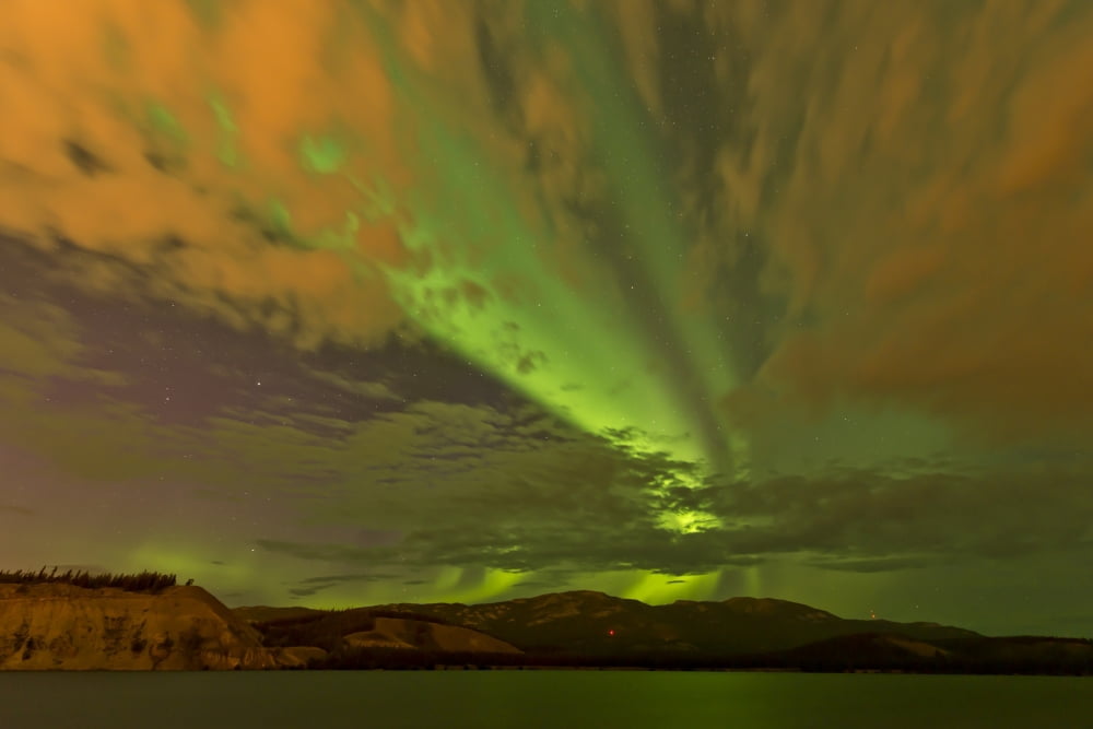 Colorful aurora borealis over lake Yukon Canada Canvas Art - Jonathan TuckerStocktrek Images (18 x 12)