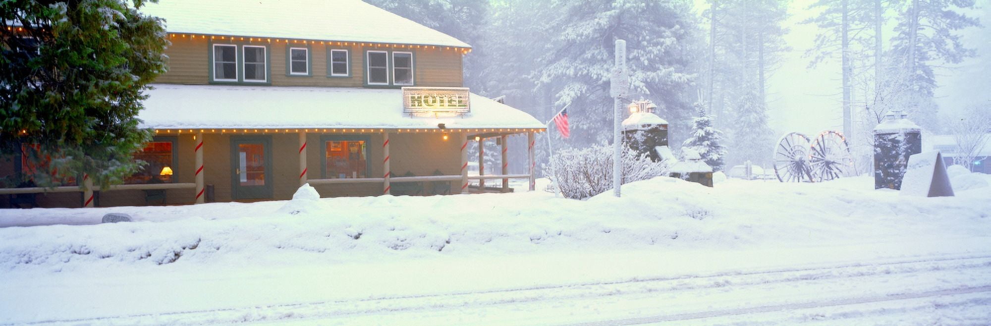 Colorful hotel in winter snowstorm Lake Tahoe area California Canvas Art - Panoramic Images (27 x 9)