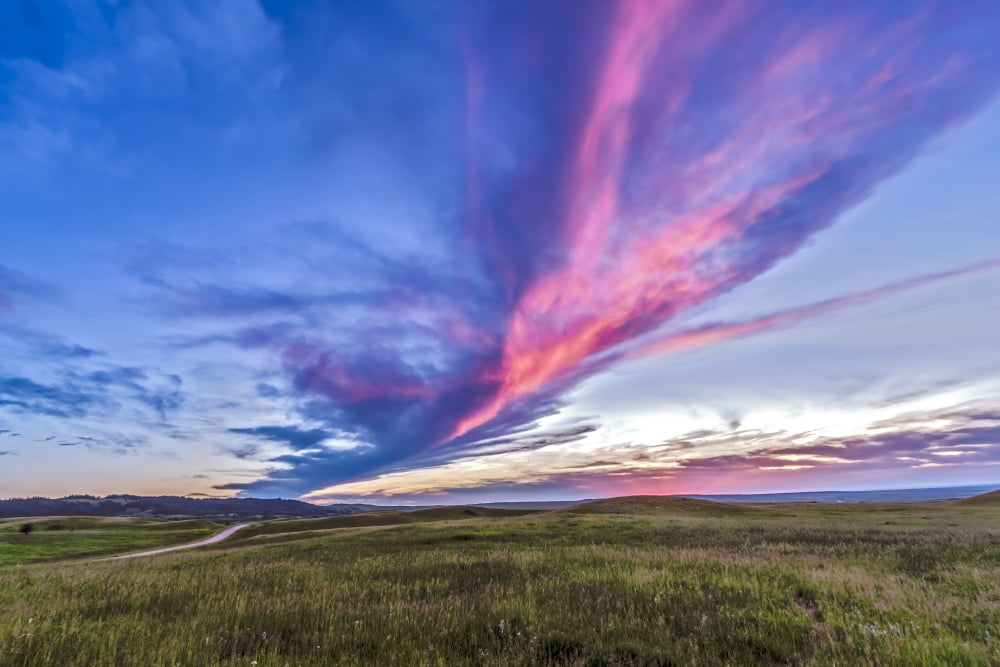 Colorful sunset at the Reesor Ranch on the Alberta-Saskatchewan border Canvas Art - Alan DyerStocktrek Images (35 x 23)