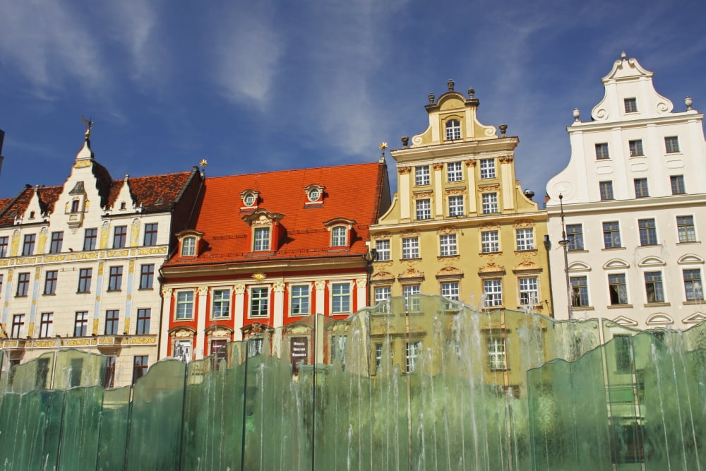 Colourful Buildings And Fountain On Rynek Square Wroclaw Poland Canvas Art - Trish Punch  Design Pics (38 x 24)