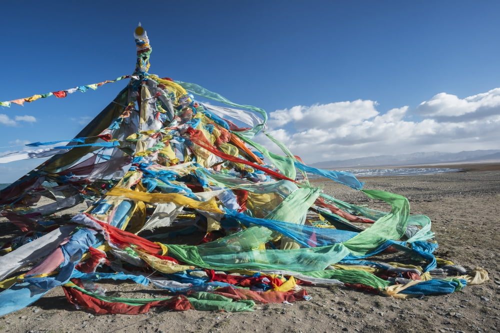 Colourful Tibetan prayer flags (Lung ta) under the strong wind near Qinghai Lake Qinghai province Tibet Canvas Art - Sergey Orlov Design Pics (19 x 12)