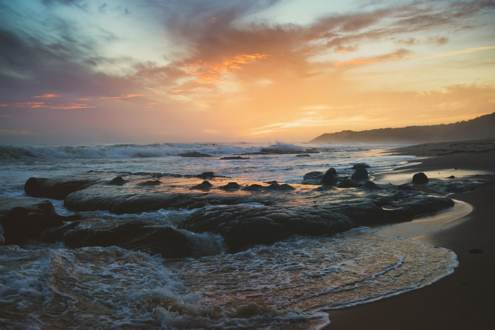 Colourful sunset and water washing up on the shore Tarifa Cadiz Andalusia Spain Canvas Art - Ben Welsh Design Pics (18 x 12)
