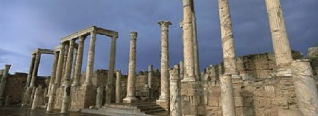 Columns of buildings in an old ruined Roman city Leptis Magna Libya Canvas Art - Panoramic Images (18 x 7)
