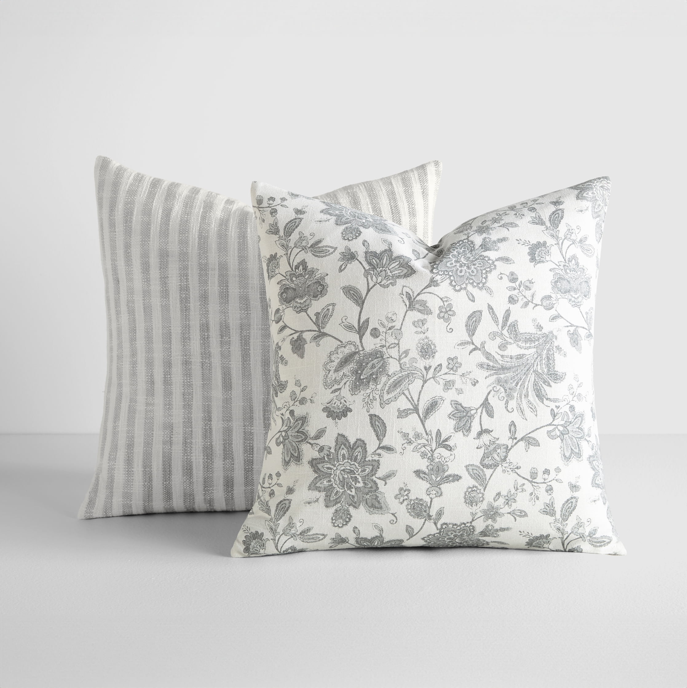 Patterned grey cushions hot sale