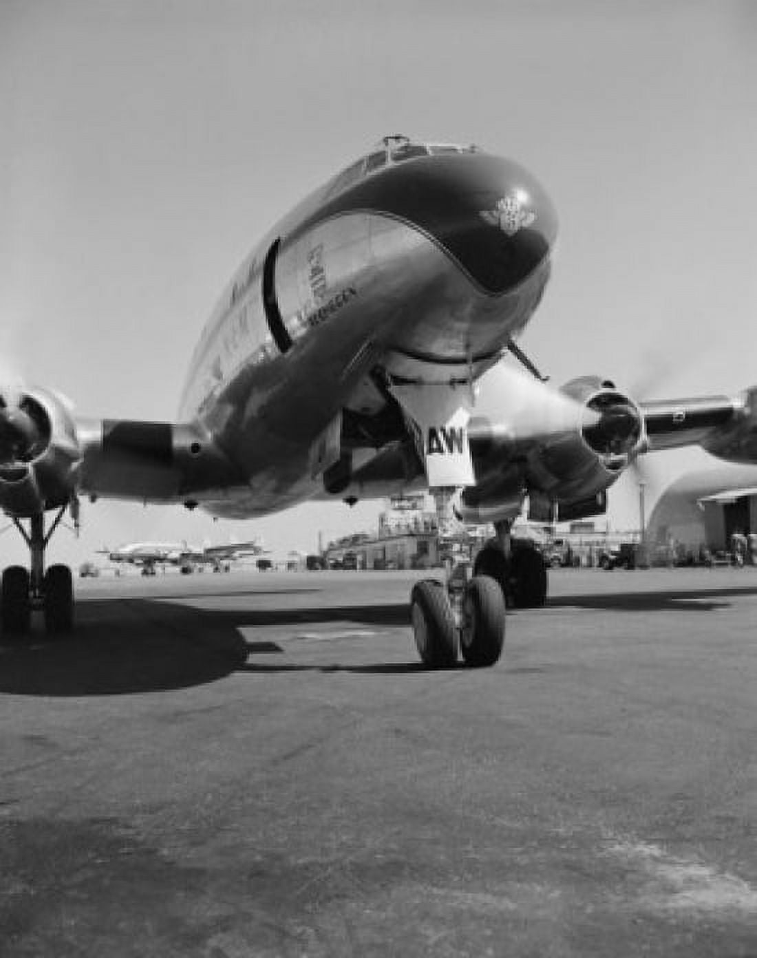 Commercial plane airport building in the background Canvas Art - (18 x 24)