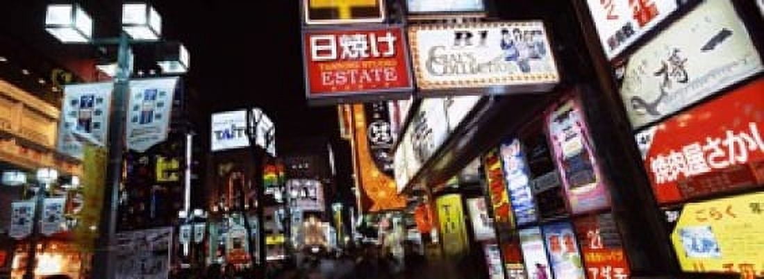 Commercial signboards lit up at night in a market Shinjuku Ward Tokyo Prefecture Kanto Region Japan Canvas Art - Panoramic Images (18 x 7)