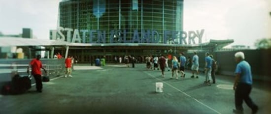 Commuters in front of a ferry terminal Staten Island Ferry New York City New York State USA Canvas Art - Panoramic Images (30 x 13)