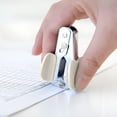 thumbnail image 1 of Compact Office Stapler Remover - Effortless One-Pinch Mechanism for Quick Staple Removal, Ideal for Home and Office Use with Secure Locking for Easy Space-Saving Storage When Not in Use, 1 of 6