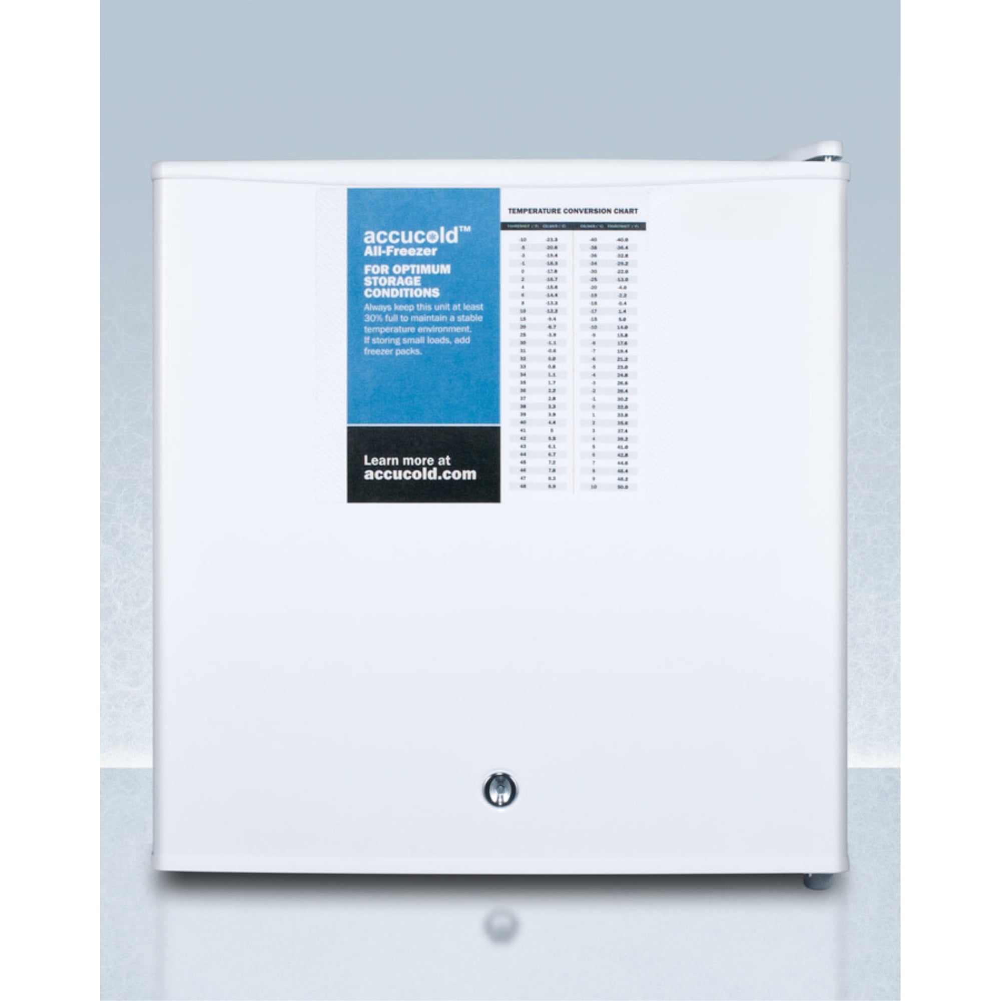 Compact manual defrost all-freezer with lock and probe hole