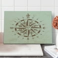 thumbnail image 1 of Compass Cutting Board, Old Compass Rose a Sun Face Lady on It Instrument Distances Between Points Graphic, Decorative Tempered Glass Cutting and Serving Board, Large Size, Tan Brown, by Ambesonne, 1 of 5