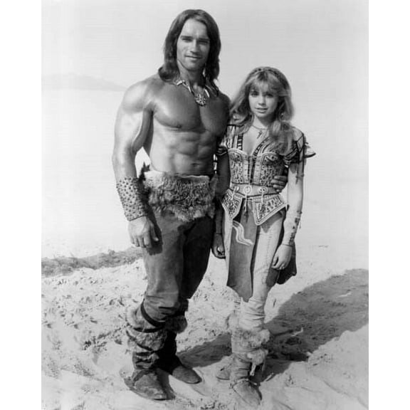 Conan The Destroyer Arnold Schwarzenegger Olivia D'Abo stand together 8x10 photo