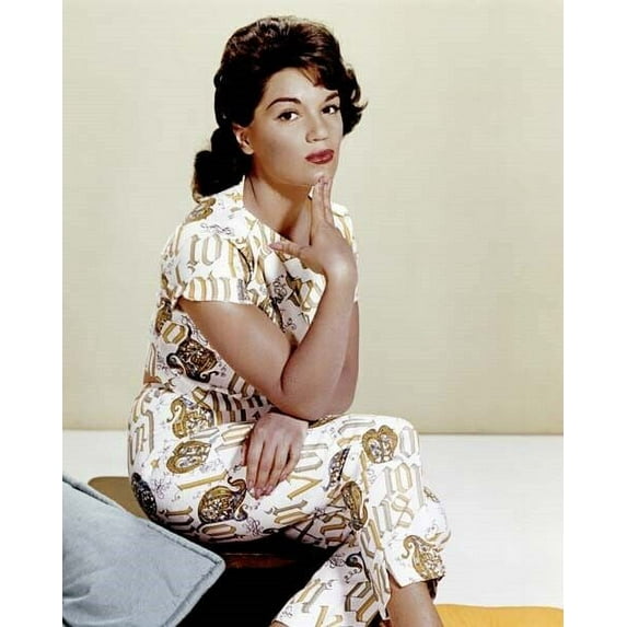 Connie Francis studio publicity pose seated on sofa 1960's 8x10 inch photo