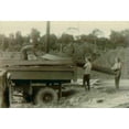 thumbnail image 1 of Construction Workers And Bobby Stroud And Others Unloading A Truck. People'S Temple Agricultural Project., 1 of 2