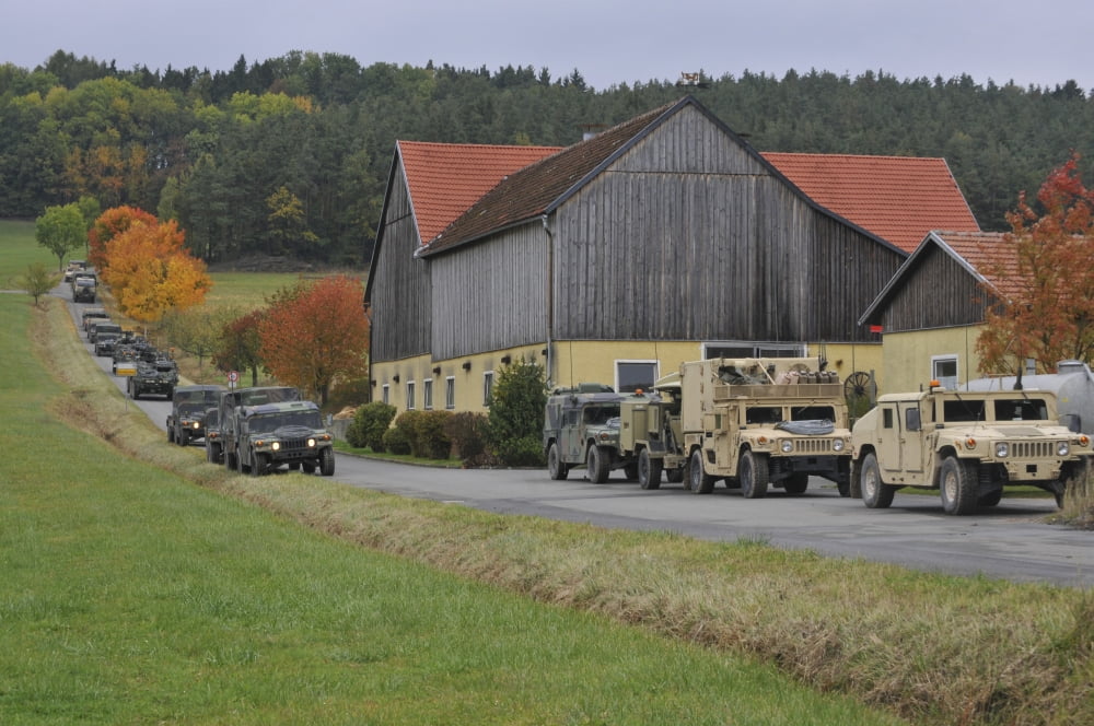 Convoy of US Army vehicles in Amberg Germany Canvas Art - Stocktrek Images (35 x 23)